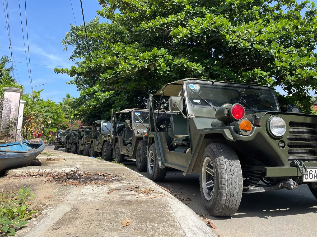 DDTravel Hoi An open-top army Jeep fleet lineup village