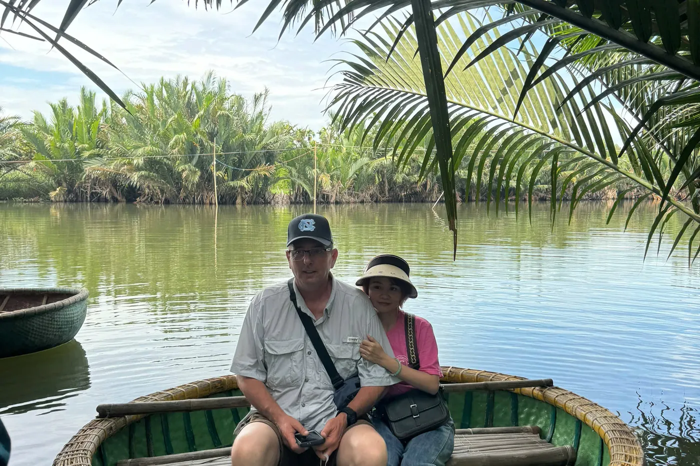 Basket boat couple nipa palm Hoi An island Jeep tour DDTravel