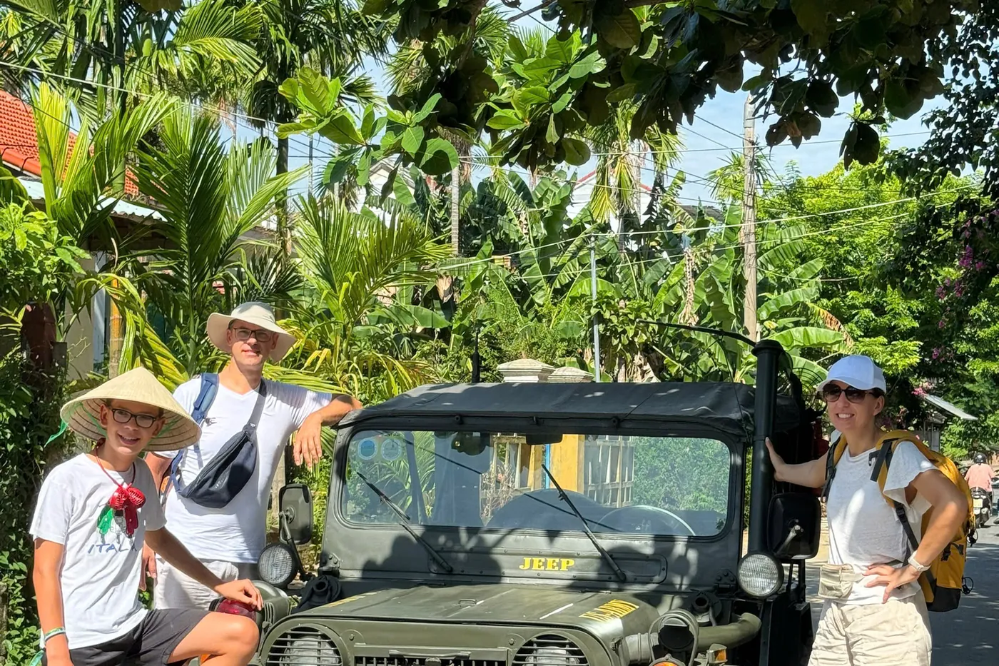 Family with Jeep village road Hoi An island tour DDTravel