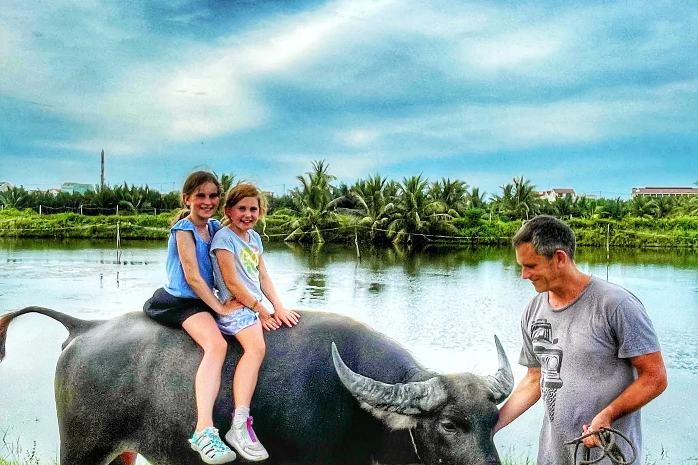Children on water buffalo countryside Hoi An island tour DDTravel