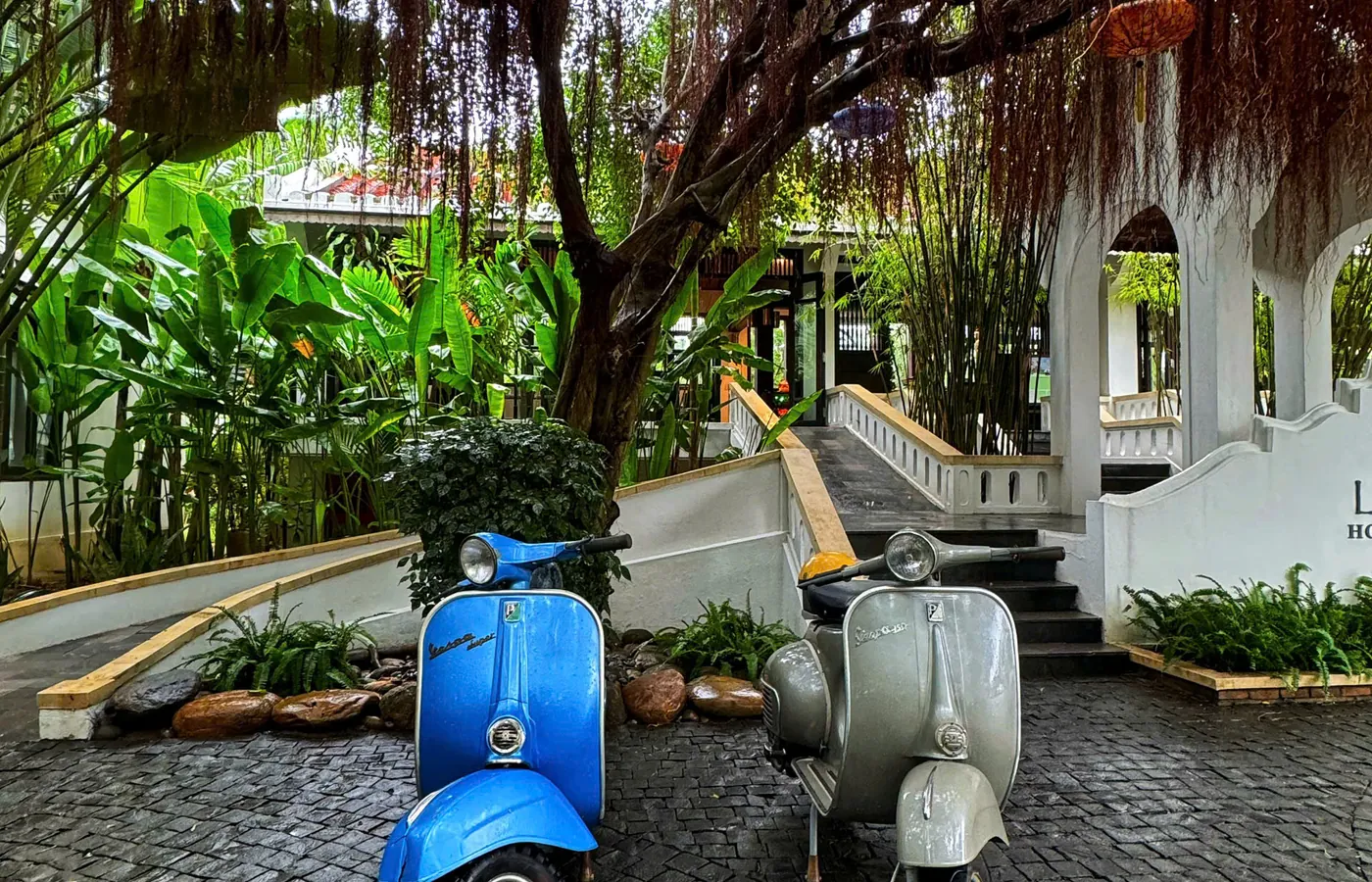 Vintage Vespa blue grey garden Hoi An DDTravel