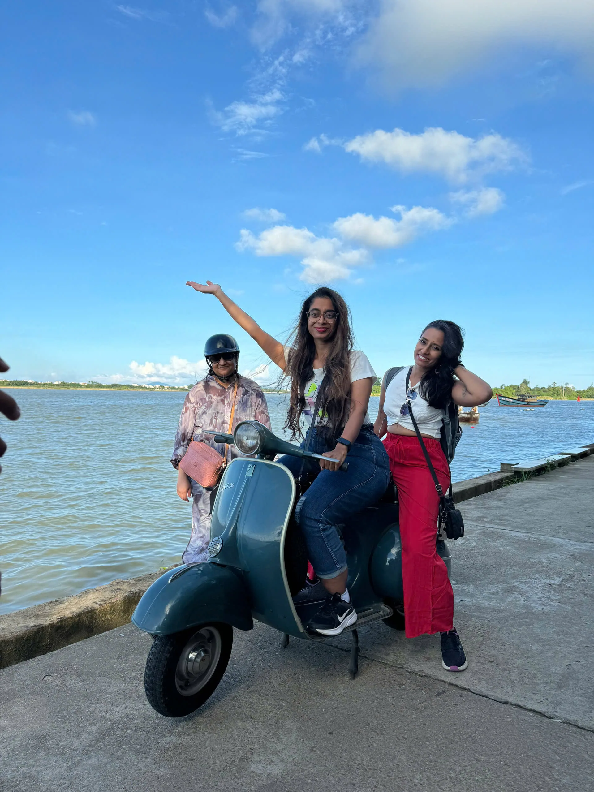Lang Co beach lagoon Vespa group photo DDTravel tour