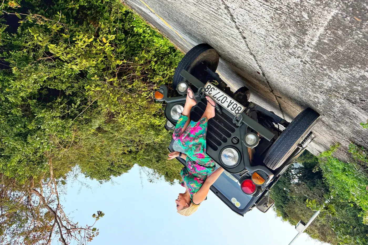 Guest on Jeep hood jungle road Son Tra DDTravel