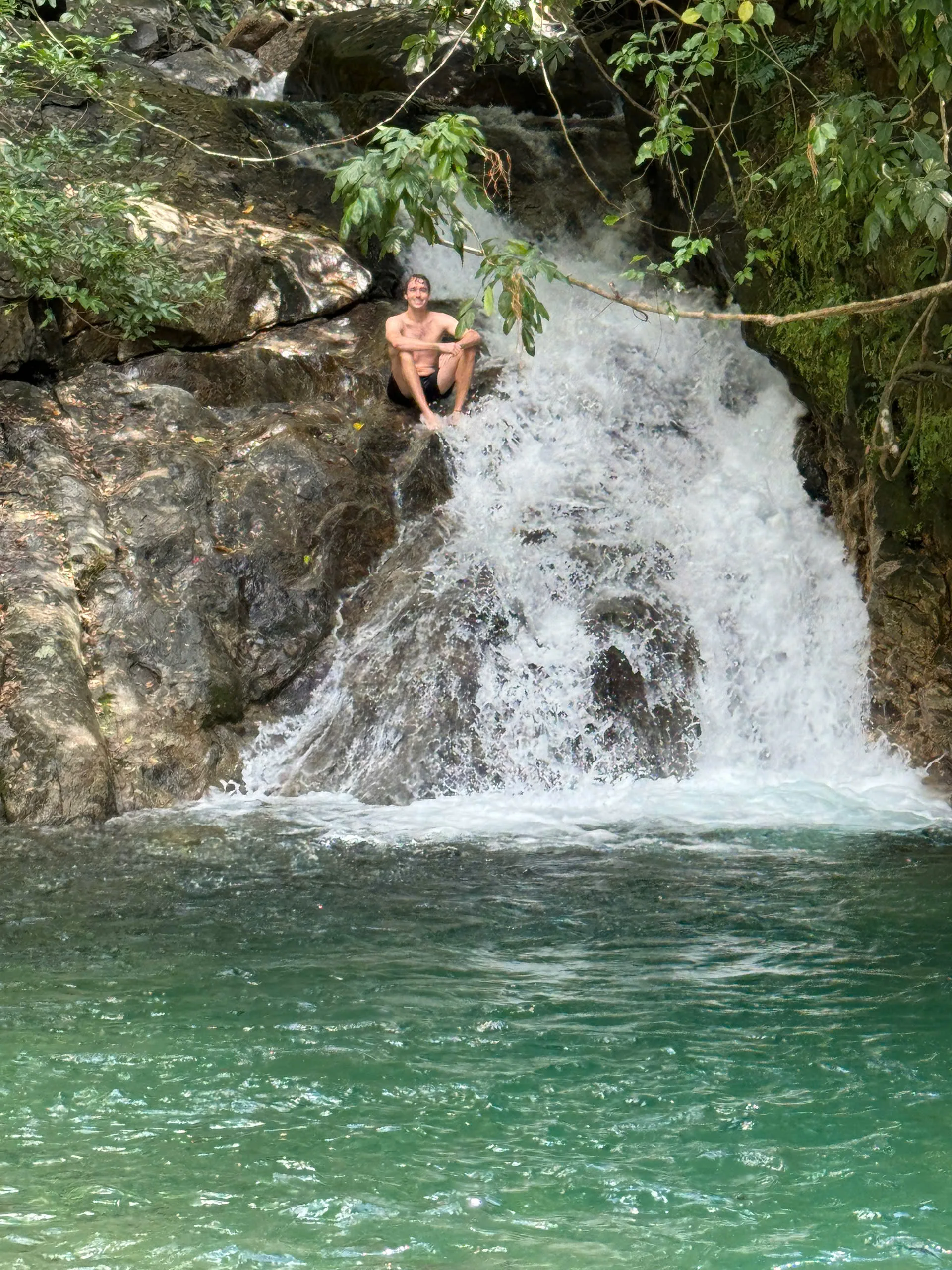 Waterfall turquoise pool swimming Hai Van Pass tour